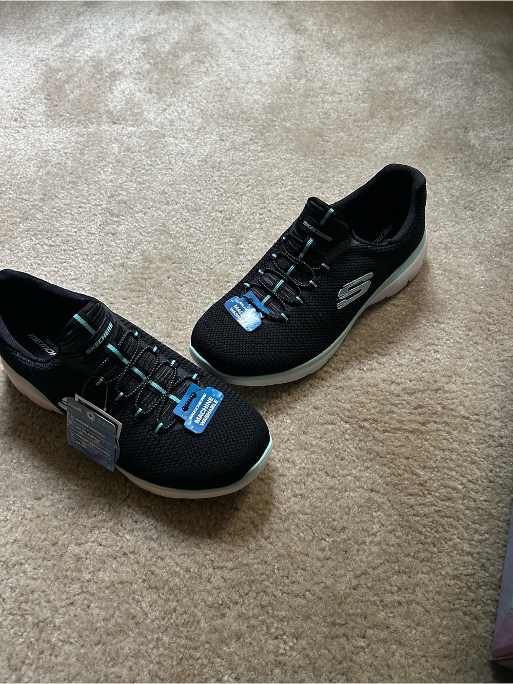 Skechers Black Slip-On Sneakers with Mint Trim